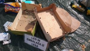 Postojna-bloki lesena emb v črni posodi
